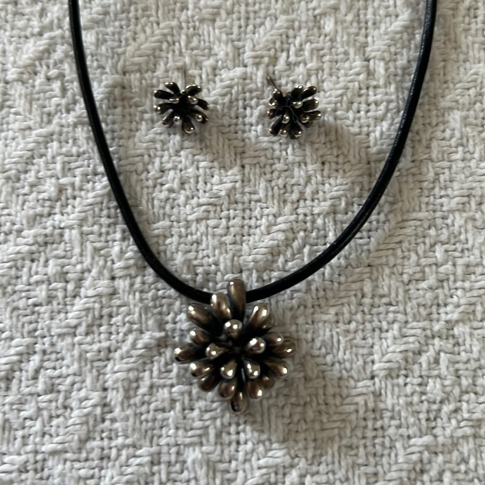 Silver fireworks necklace and earrings.